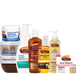 Palmer's Must-Haves Bundle pictured with an arrangement of skin care and face care products.