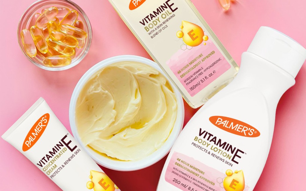 flatlay of vitamin e body lotion, vitamin e concentrated cream, vitamin e body oil and vitamin e body butter
