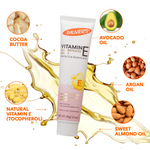 Palmer's Vitamin E cream tube with ingredients like cocoa butter, avocado oil, argan oil, and sweet almond oil displayed around it.