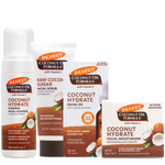 A set of Palmer's Coconut Oil Formula facial skincare products on a white background, including a foaming facial cleanser, a facial scrub, a facial oil, and moisturiser.