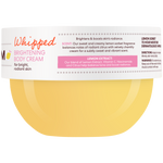 A jar of Whipped Brightening Body Cream with a white label and a pale yellow cream visible inside, on a clean white background.