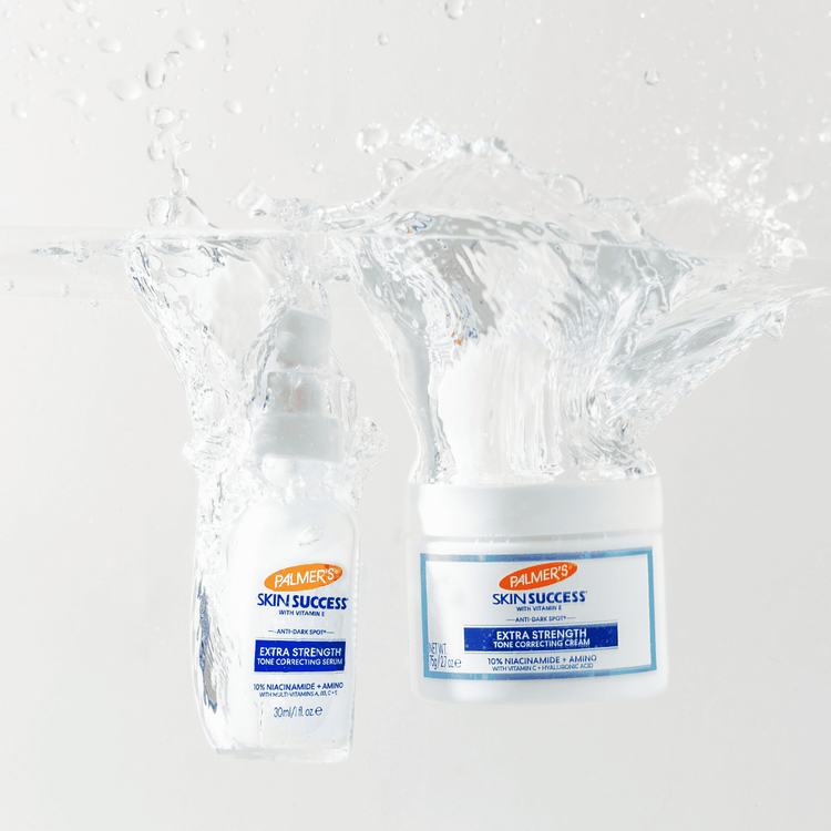 This is a picture of Palmer's Skin Success Extra Strength Cream and Serum being dropped into water.