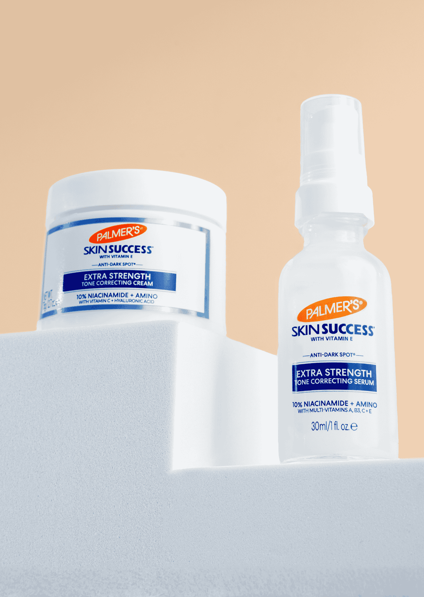 Palmer's Skin Success Extra Strength range shown on white blocks with a peach background.