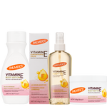 A Palmer's Vitamin E Body Care set featuring a white body lotion bottle, a concentrated vitamin E cream box, a vitamin E body oil spray bottle, and a body butter jar, all on a plain white background.