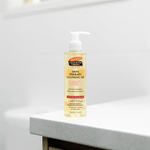Bottle of Palmers Skin Therapy Cleansing Oil on a white surface