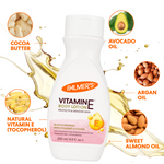 Palmer's Vitamine E body lotion with ingredients displayed around it on a white background