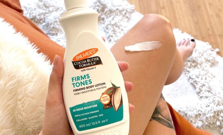 palmer's firming body lotion smoothed onto leg